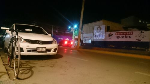 Cars on road at night