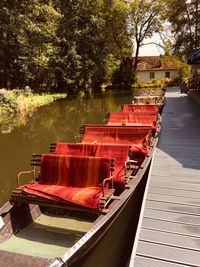 Boats moored on lake