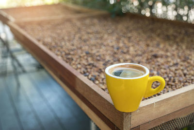 High angle view of coffee cup on table