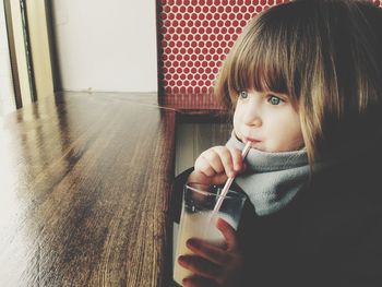 Girl drinking juice