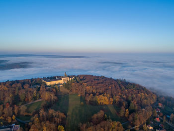 High angle view of buildings against sky during autumn