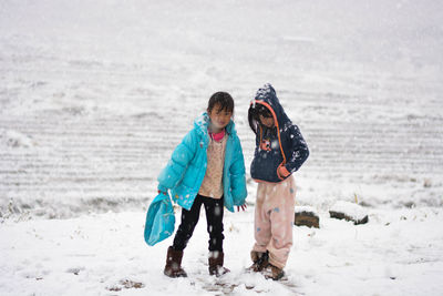 Two cute children in winter