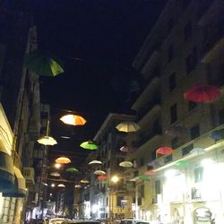 Low angle view of illuminated street light at night