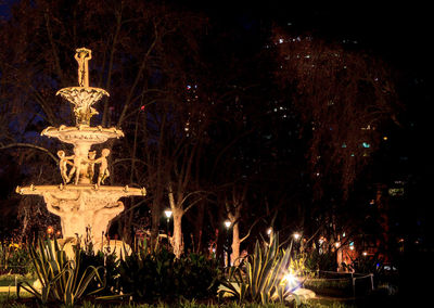 View of illuminated building lit up at night