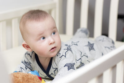 Portrait of cute baby at home