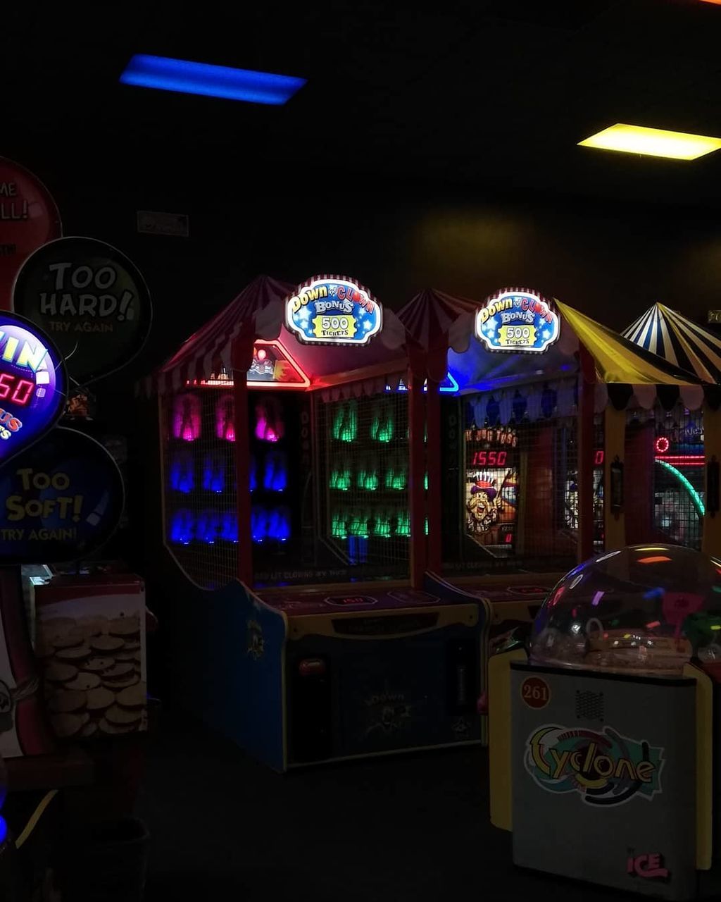 illuminated, multi colored, no people, lighting equipment, indoors, gambling, arts culture and entertainment, night, choice, variation, casino, slot machine, arrangement, leisure activity, large group of objects, retail, glowing, communication, dark, store, nightlife, luxury