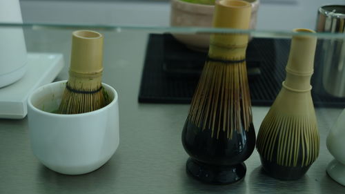 Close-up of paintbrushes on table