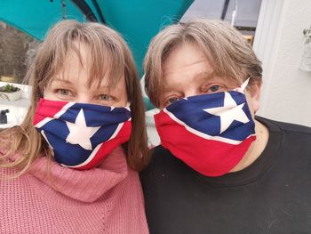 Self made corona masks weared by middle aged couple in germany. selfportrait 