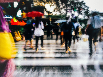 Blurred motion of people in shopping mall