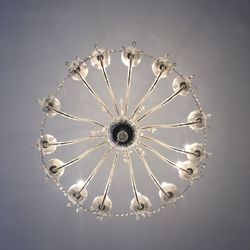 Low angle view of illuminated chandelier