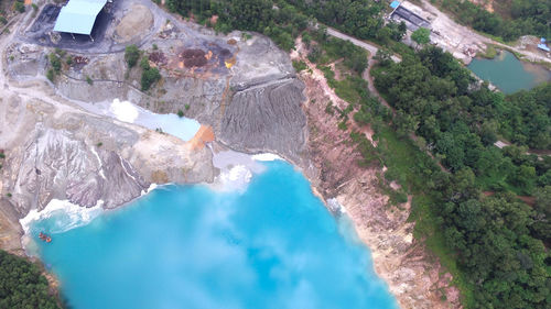 High angle view of dam on mountain against sky