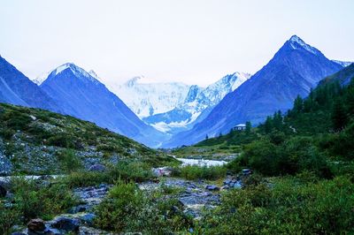 Scenic view of snowcapped mountains against sky