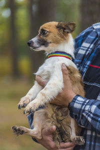 Full length of man holding dog