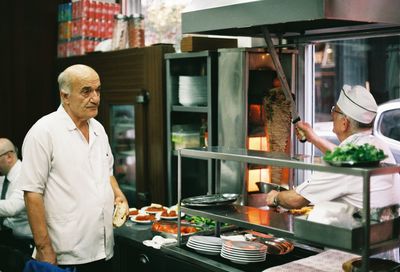 Man preparing food in kitchen