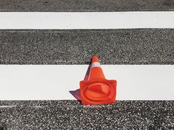 Close-up of red toy car on road