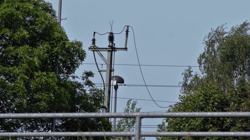 Low angle view of power lines