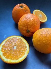 Close-up of oranges on table