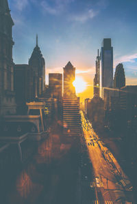 Panoramic view of buildings against sky during sunset