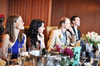 People sitting at table during wedding