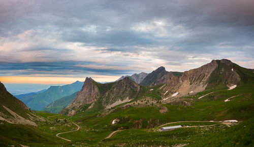 Scenic view of mountains against sky during sunset