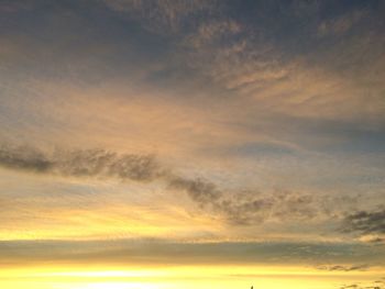 Low angle view of dramatic sky during sunset