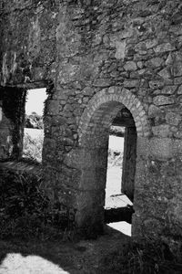 Old building seen through arch window