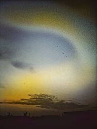 Scenic view of landscape against sky at sunset