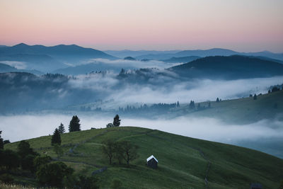 Scenic view of landscape against sky during sunset