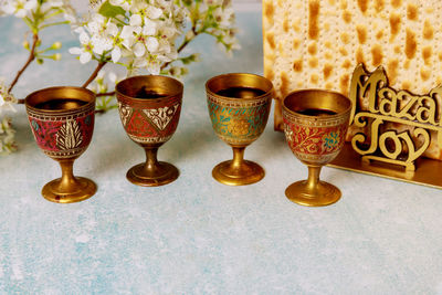 Close-up of wine glasses on table