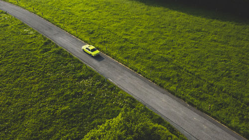 High angle view of road amidst field