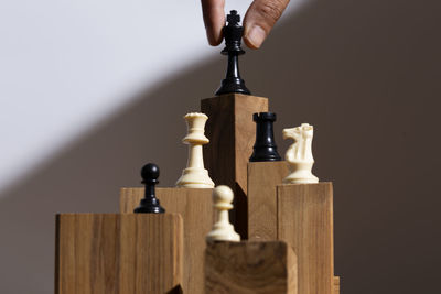 Close-up of chess pieces against white background