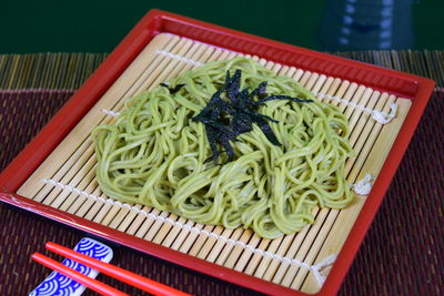 High angle view of vegetables in plate on table