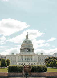 View of capitol building against cloudy sky