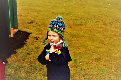 Full length of boy in grass