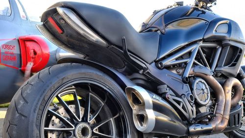 Close-up low angle view of black motorcycle