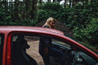 Young woman in car