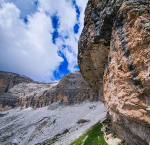 Low angle view of rock formation against sky