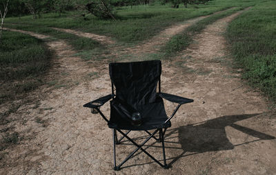 High angle view of chair on field