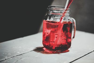 Close-up of drink in mason jar on table