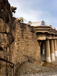 Low angle view of pillars and a wall