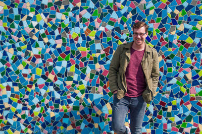 Portrait of young man standing outdoors