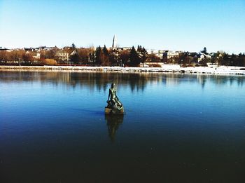 Reflection of buildings in water