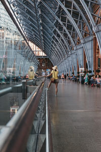 People walking on bridge