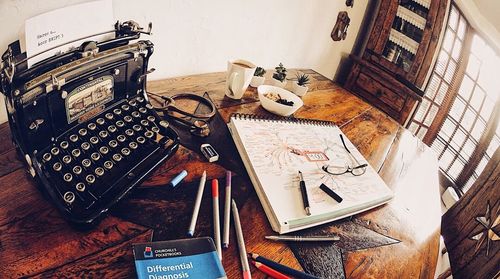 High angle view of telephone on table