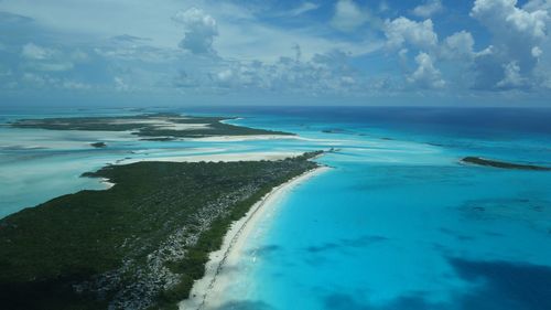 Scenic view of sea against cloudy sky