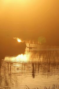 Scenic view of sunset over sea
