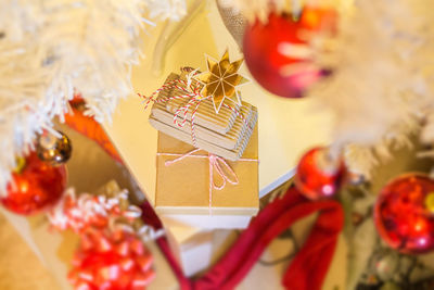 Close-up of christmas decoration on table at home