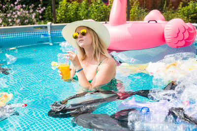 Full length of woman in swimming pool