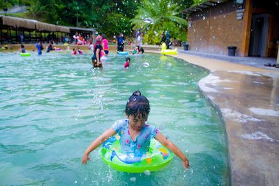 Girl swimming in pool