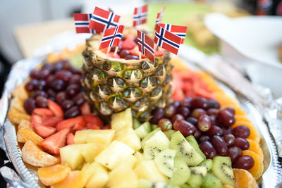 Close-up of chopped fruits in plate